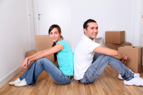 House removal team transporting furniture in Finsbury Park